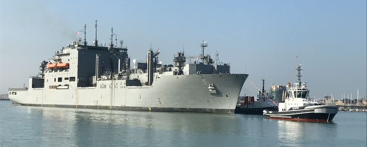 Tug boat and UK Navy Ship