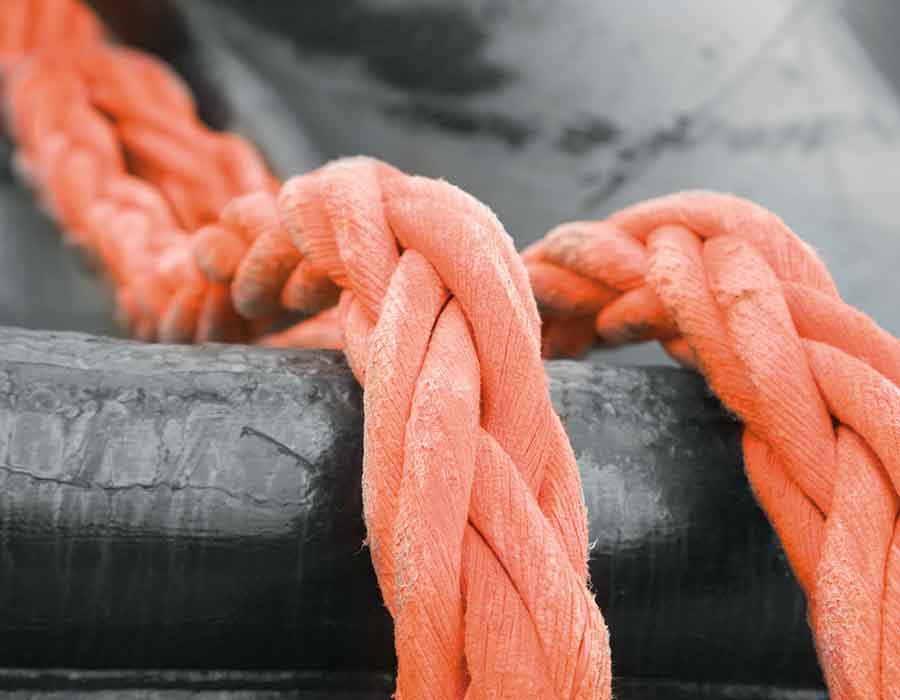 Close-up of a heavy-duty orange tow rope by Samson Rope