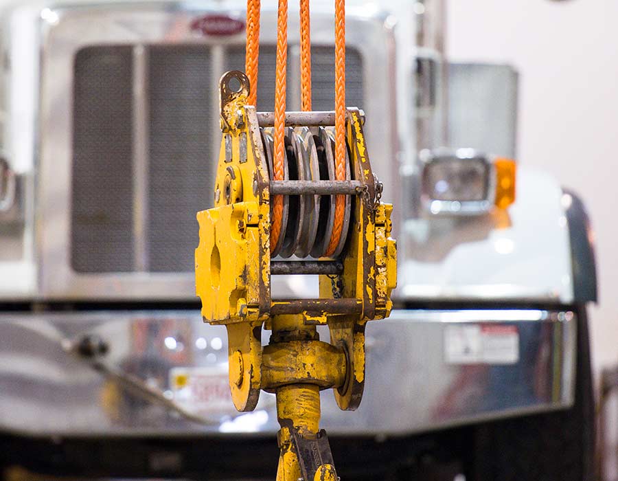 Yellow crane winch equipped with Samson Rope for industrial lifting