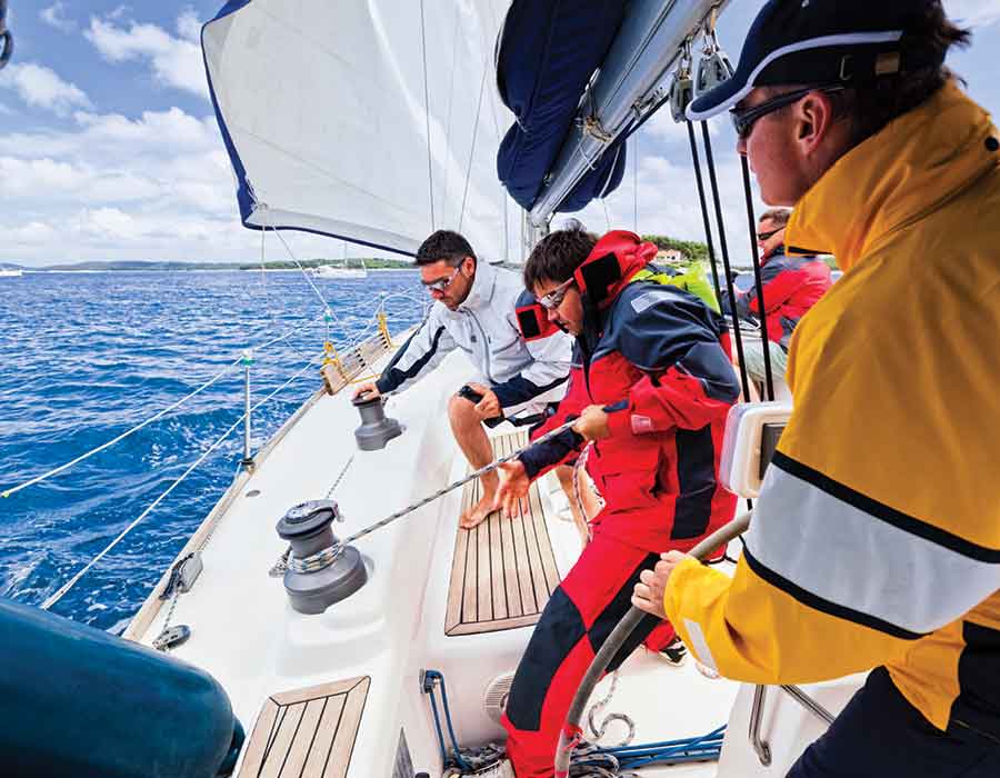 Crew using Samson Rope marine rope products during a recreational sailing trip